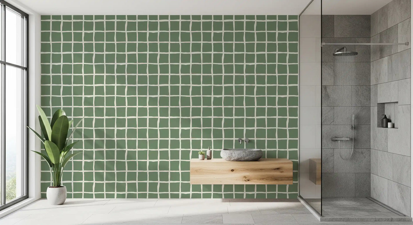 Geometric sage grid wallpaper with uneven organic squares in bathroom.