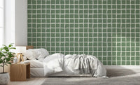 White wavy lines on medium sage green background wallpaper for bedroom.