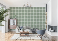 Wallpaper showing sage green wavy grid pattern with white lines.