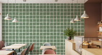 Mid century geometric grid pattern wallpaper in sage tones.