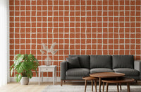 Terracotta wavy grid wallpaper in a contemporary living room.