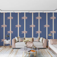 Nautical rope knot motifs on dusty blue wallpaper with cream vertical stripes.