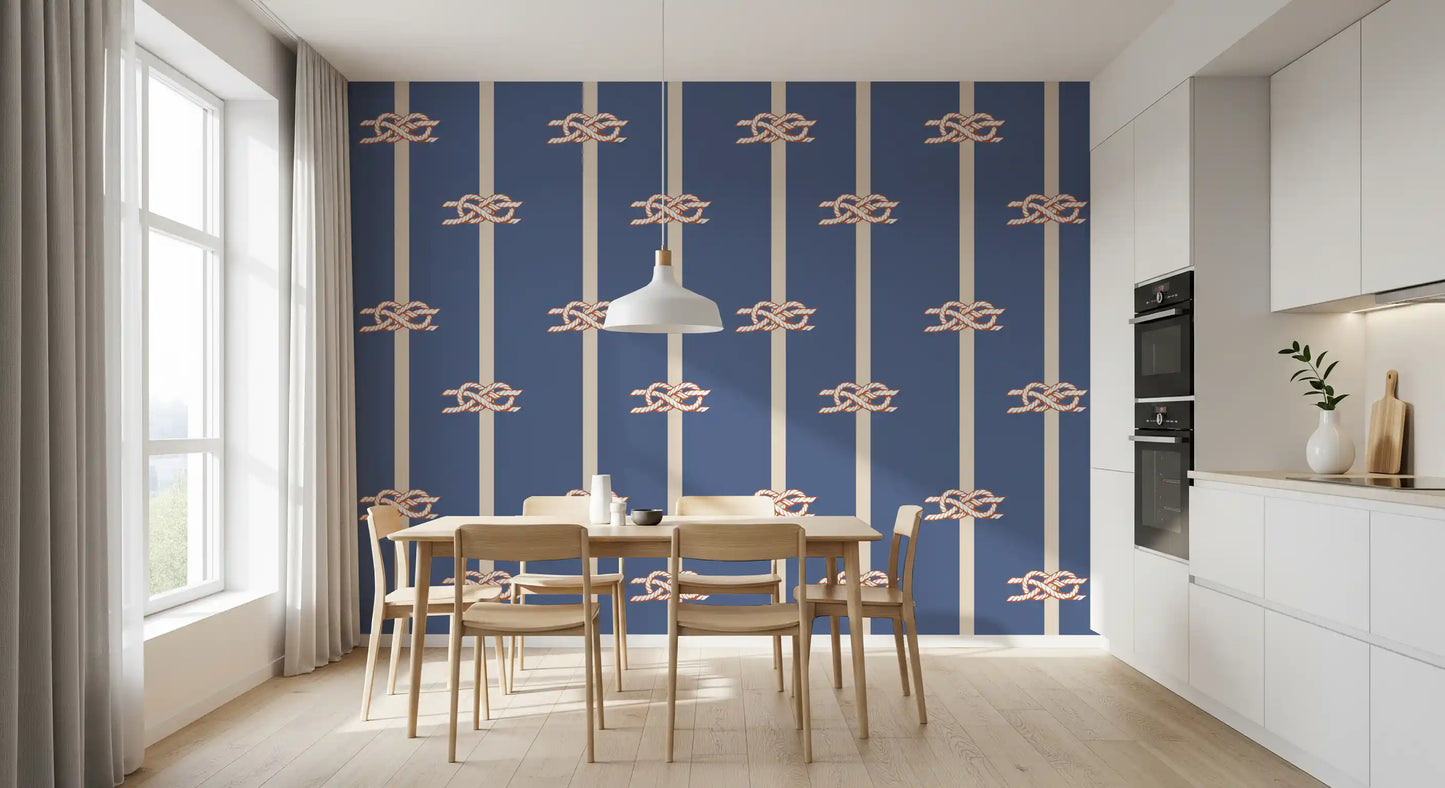 Terracotta and white sailor knots on blue striped wallpaper in dining room.