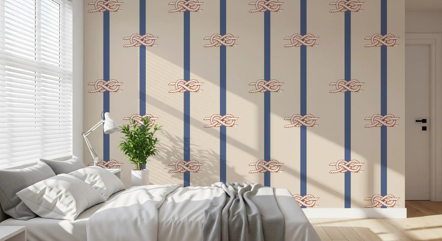 Nautical wallpaper pattern showing rope knots on navy vertical stripes in bedroom.