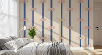 Nautical wallpaper pattern showing rope knots on navy vertical stripes in bedroom.