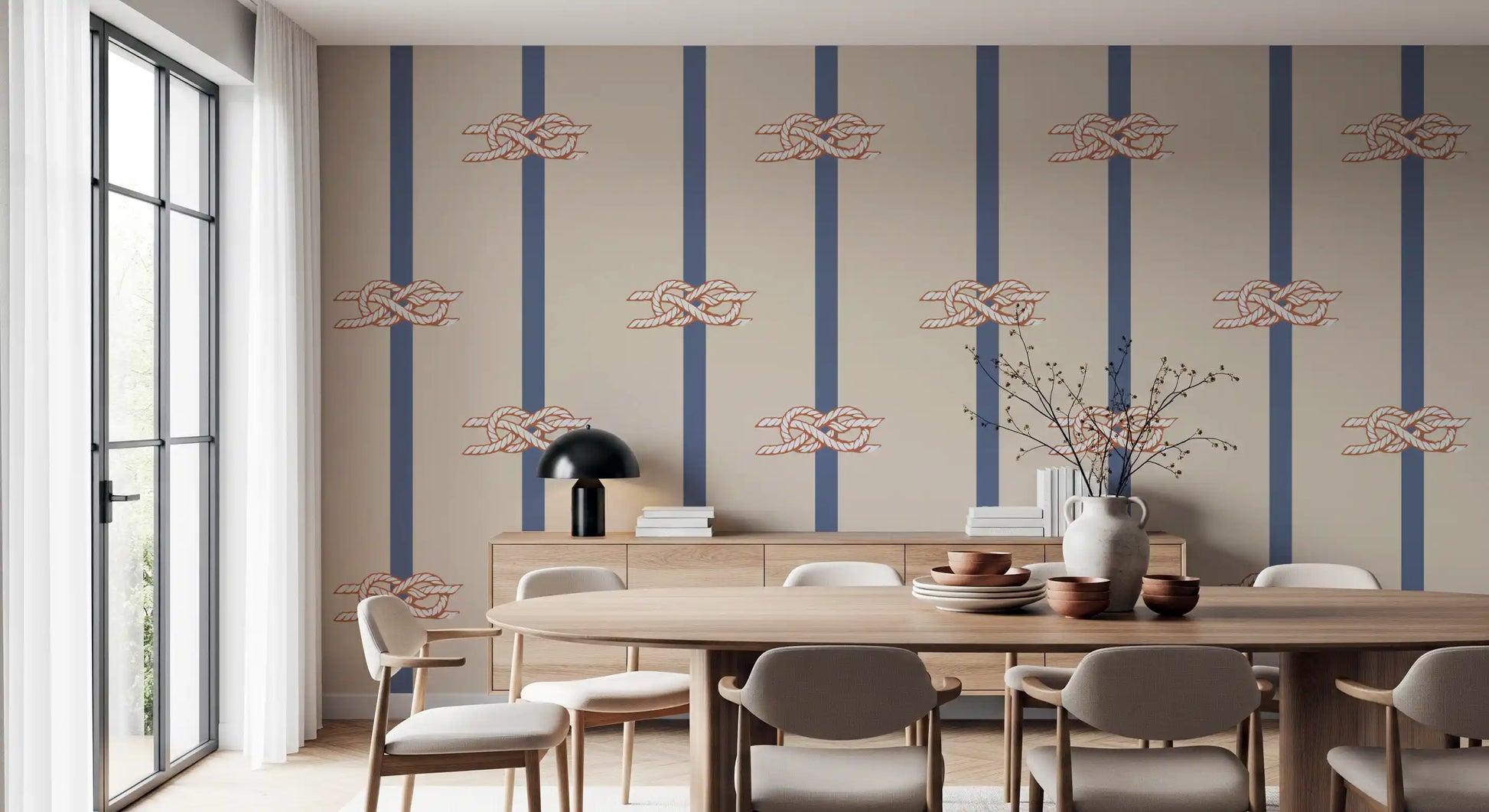 Coastal rope knot and stripe wallpaper in warm beige and navy palette in dining room.