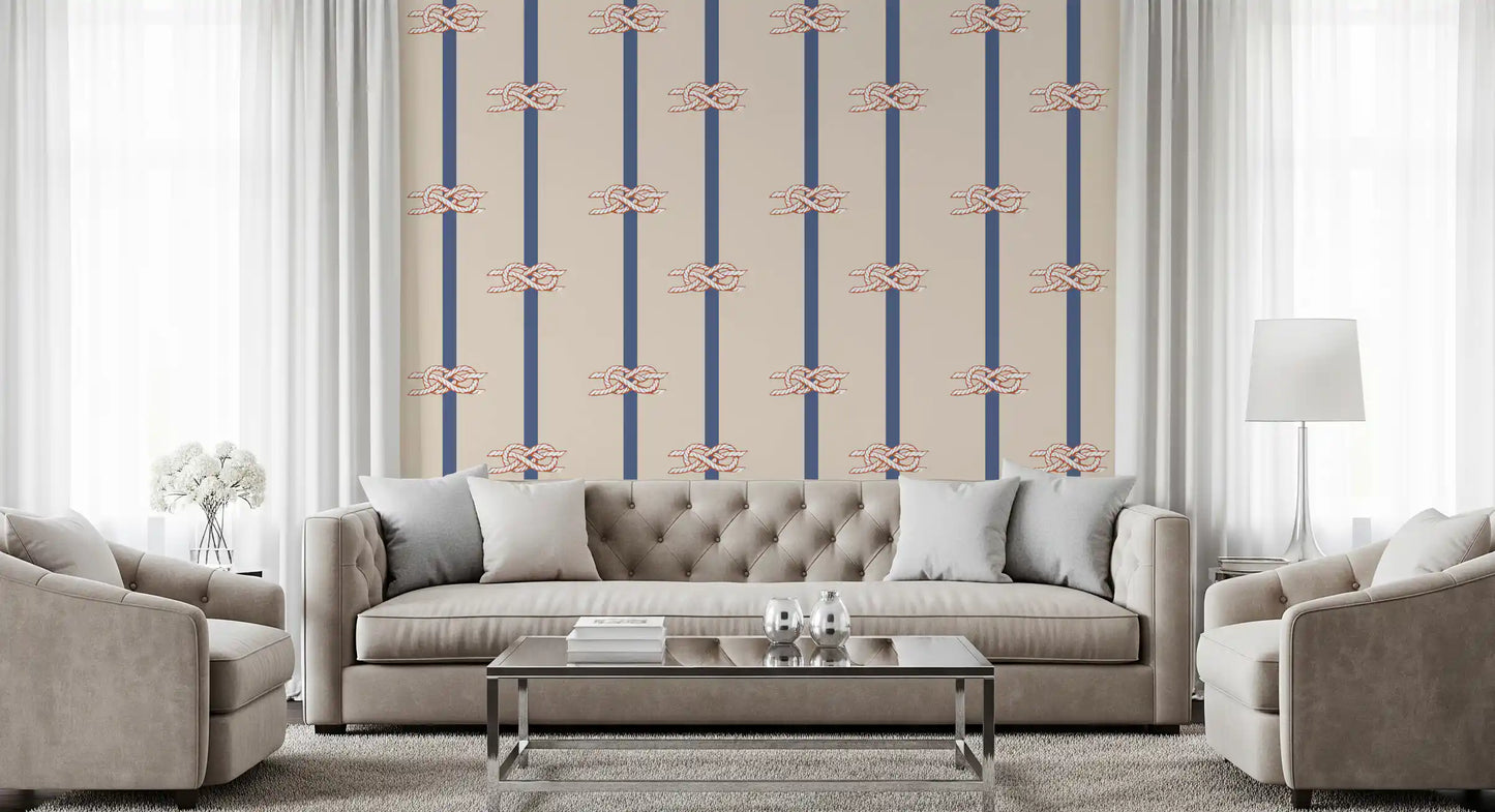 Beige wallpaper with terracotta sailor knots along navy stripe bands.