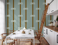 Green and olive striped wallpaper with white rope knot motifs.
