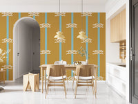 Sky blue vertical stripes with white rope knot motifs on mustard wallpaper.