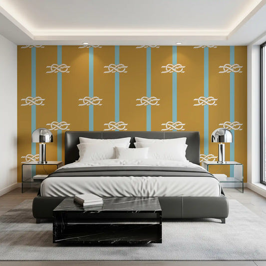 Nautical rope stripe wallpaper in a bedroom with mustard and blue tones.