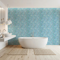Wallpaper showing aqua knit cascade pattern in blue and teal tone in bathroom.