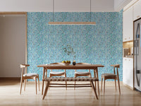 Teal and navy paired leaf marks on white background knit wallpaper for dining area.
