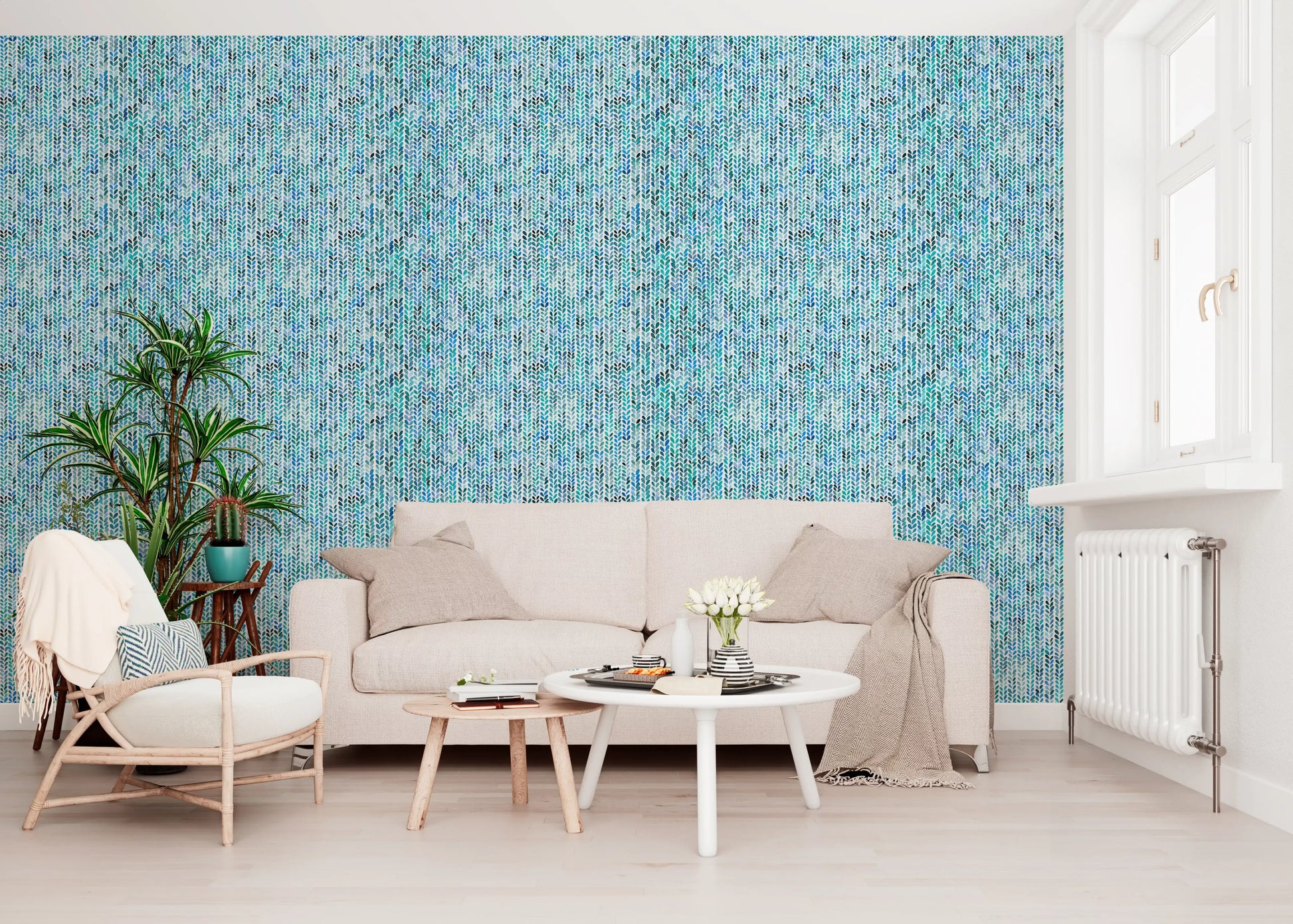 Aqua knit cascade wallpaper with paired leaf motifs in multiple blue shades.