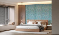 Aqua knit cascade wallpaper in a bedroom with blue and teal tones.