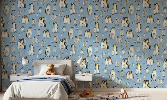 Soft blue penguin pattern wallpaper displayed in a children's bedroom.
