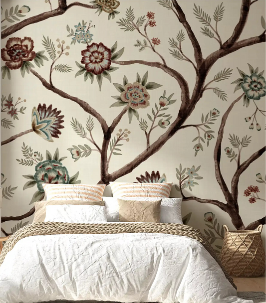 Bright chintz revival botanical tree wall mural displayed in a bedroom space.