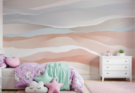 Watercolour dunes wall mural in a kids bedroom with terracotta tones.