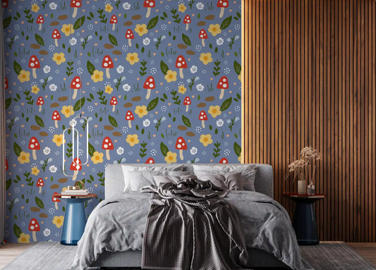 Blue woodland pattern wallpaper displayed in a bright bedroom.