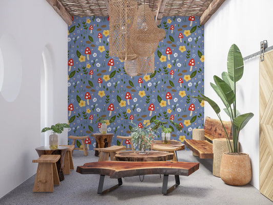 Green leaves peach hearts and brown stones wallpaper on muted blue patterned ground.