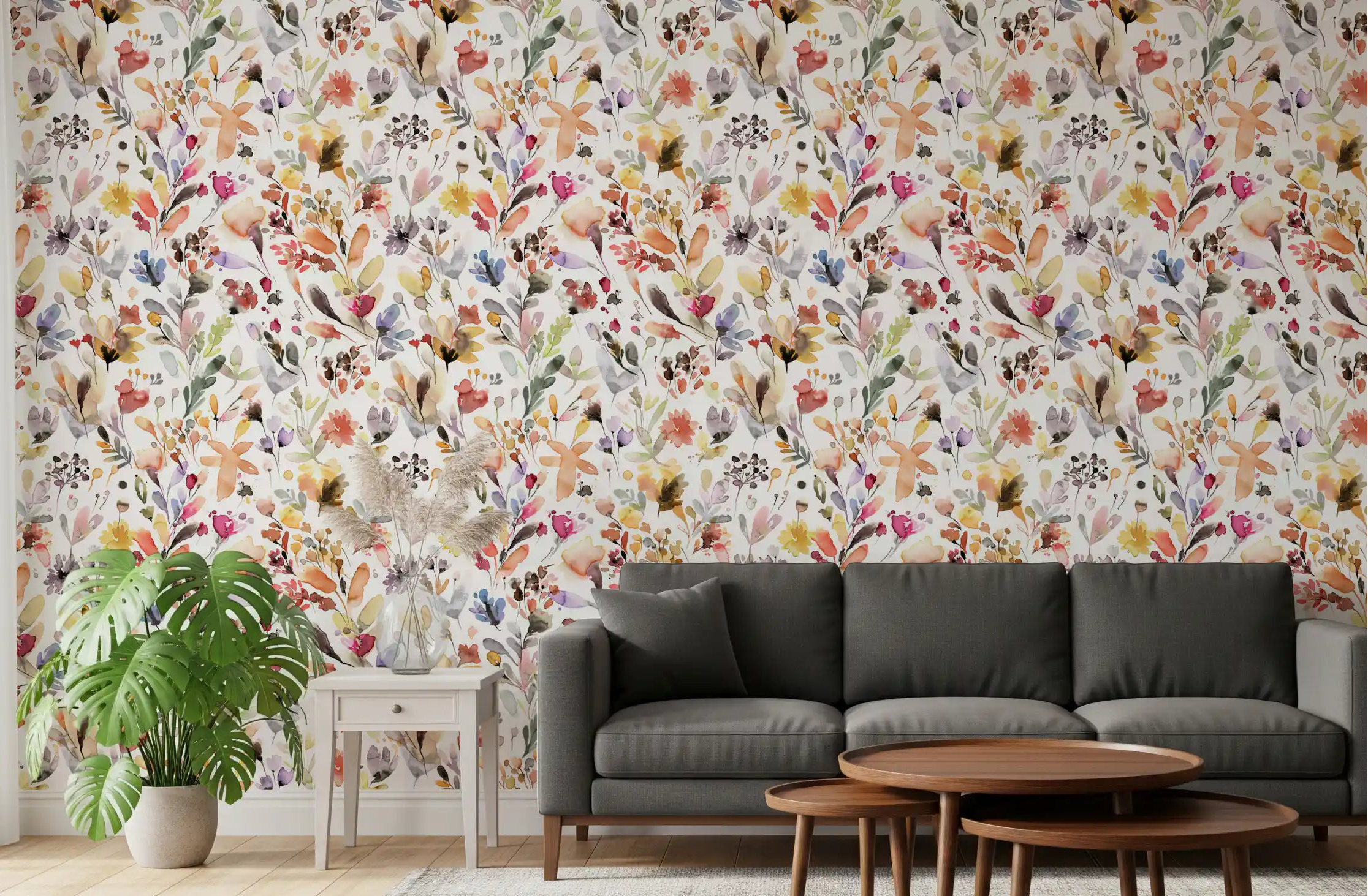 Watercolour wildflower meadow wallpaper in a warm toned living room.