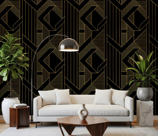 Symmetrical gold linework across matte black wallpaper in living room.