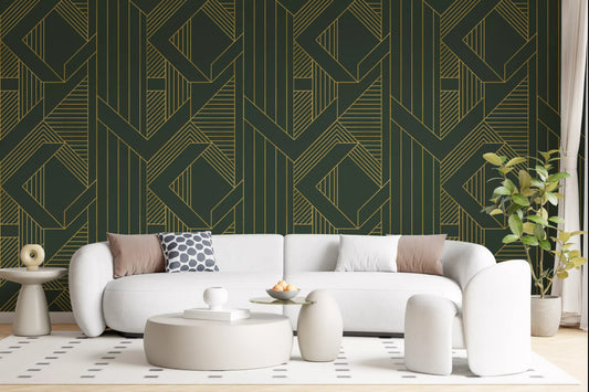 Living room wall covered in olive green and gold geometric wallpaper.