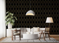 Repeating gold ogee leaf pattern wallpaper on a deep black background., GD10647