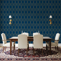 Metallic gold leaf pattern repeated on navy wallpaper in dining room., GD10649