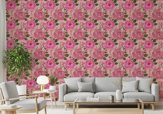Living room with large pink peony floral wallpaper on blush background.