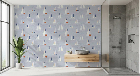 Bathroom edged with coastal blue sailboats wallpaper in mid century scene