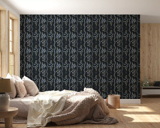 Blue flowers and sage leaves on midnight charcoal floral wallpaper in bedroom GD10741 
