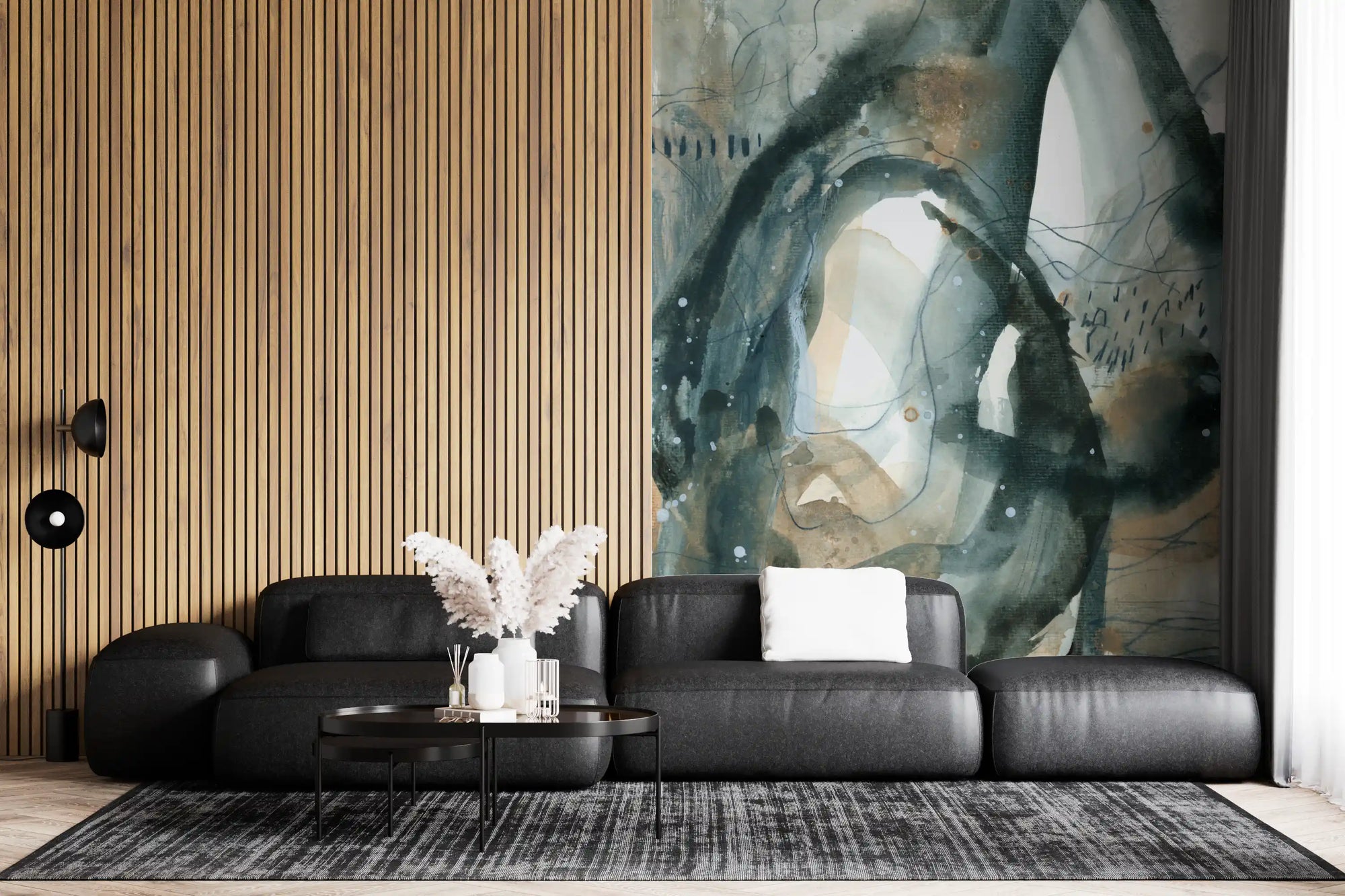 Abstract watercolour wall mural with fluid charcoal and teal brushstrokes in living room GD10848