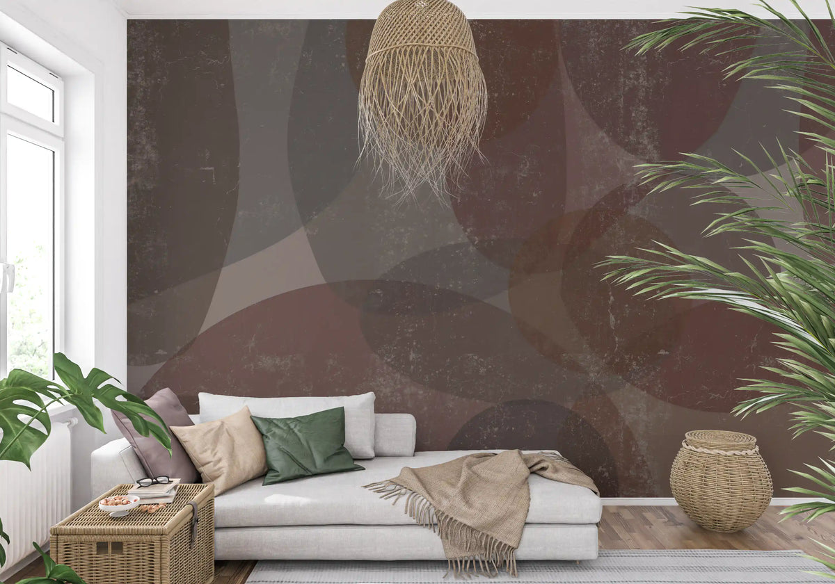 Rustic earth tones abstract pebble wall mural with overlapping curved shapes in living area GD10868