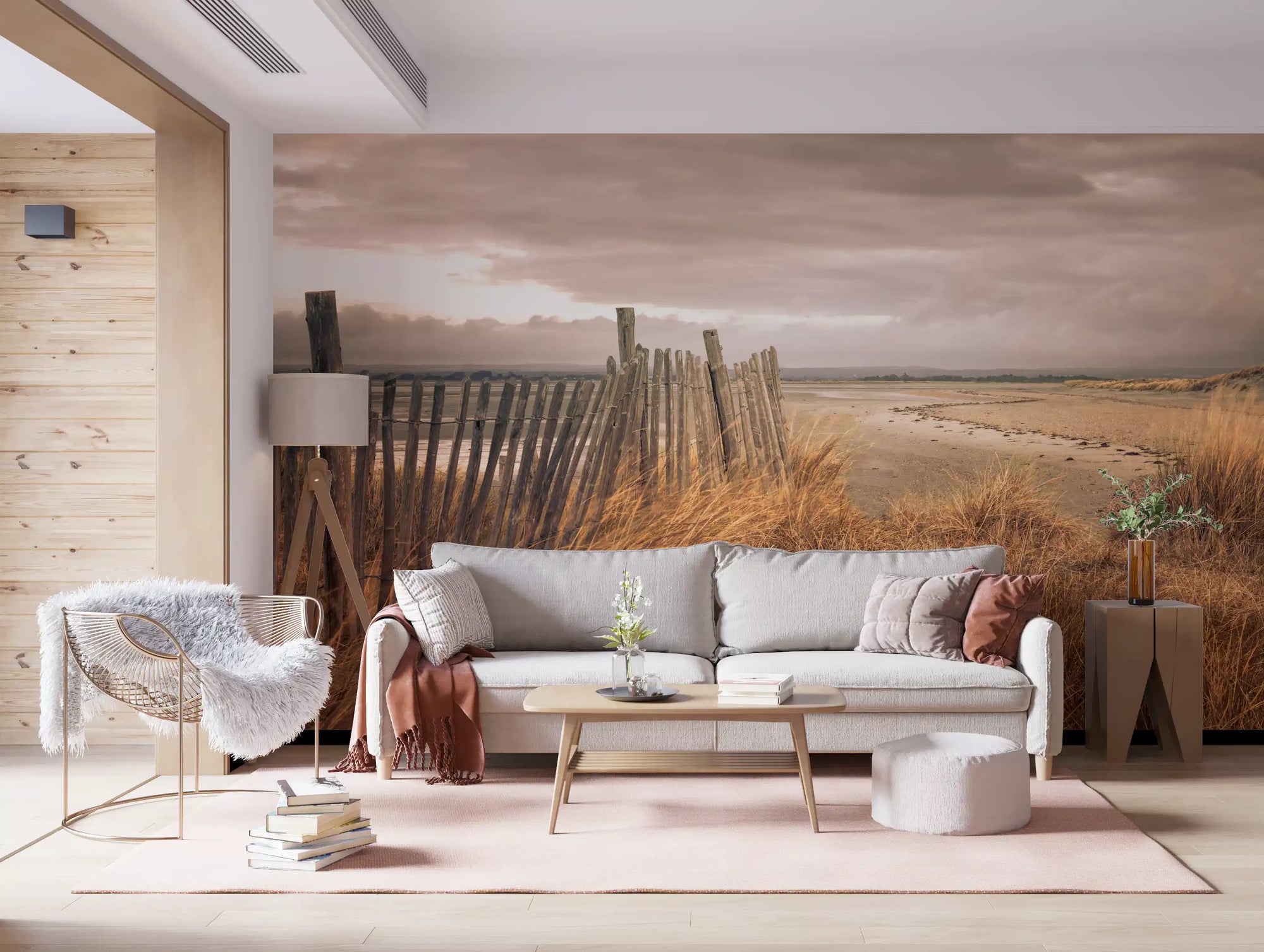 Golden dune grass mural with weathered wooden fence and cloudy coastal sky in living area GD10911
