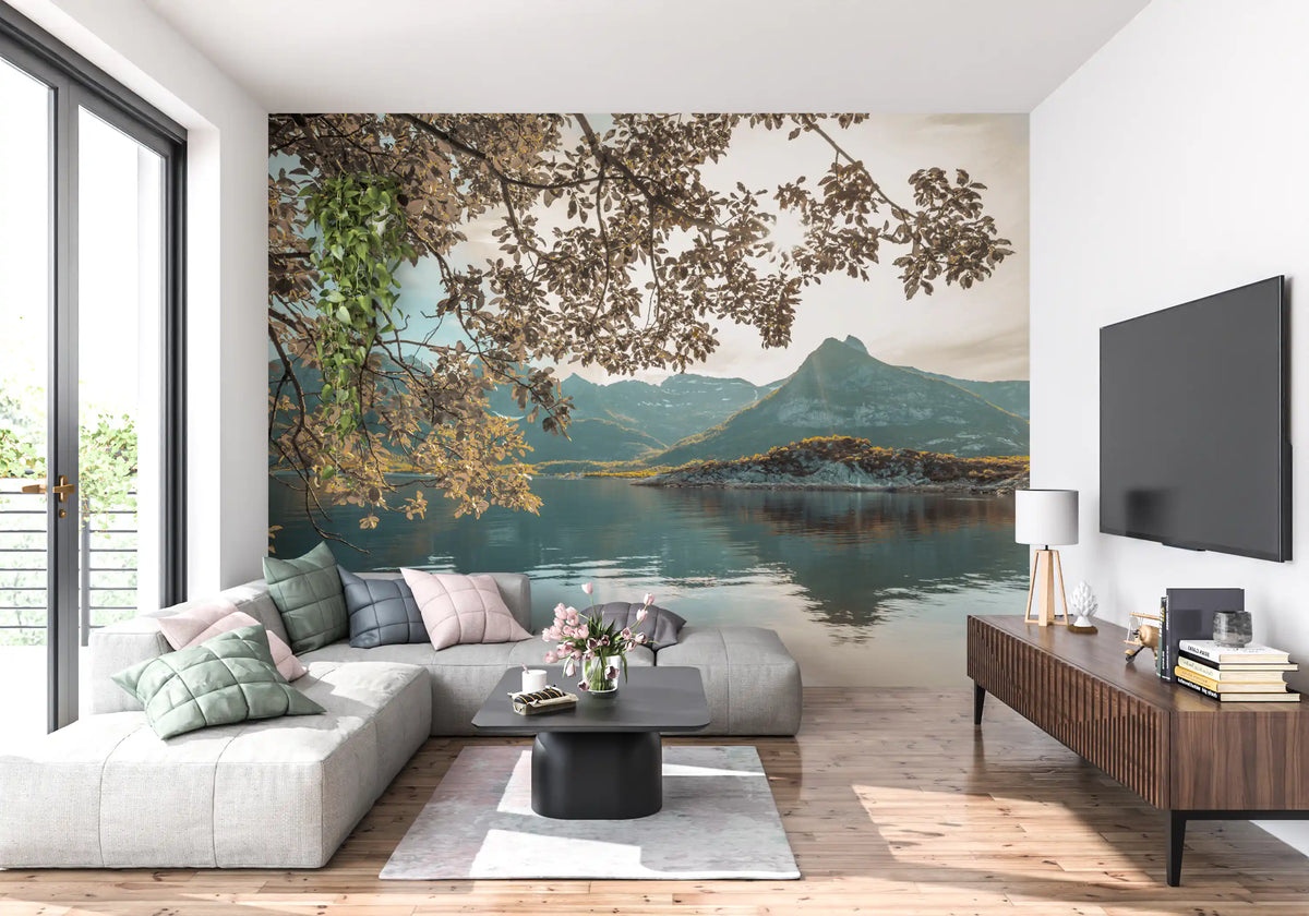 Sunlit lake mural with golden leaves and a rugged mountain range in living area GD10915