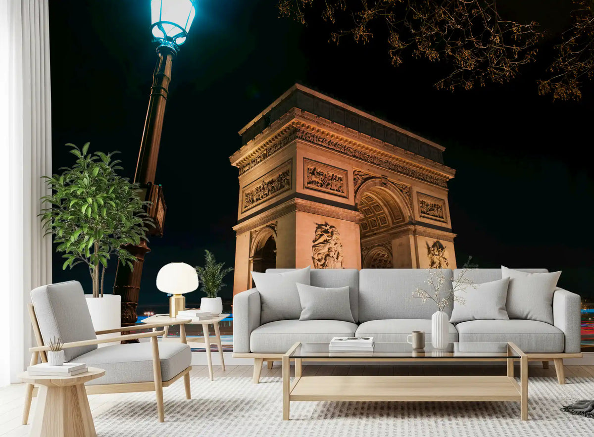 Parisian night Arc de Triomphe mural with warm gold lit facade and dark sky in living room GD10922