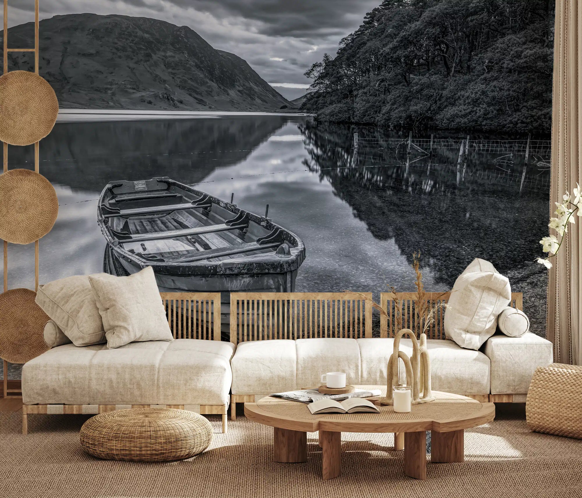 Monochrome wooden boat resting on pebbled lakeshore mural with still water in living room GD10943