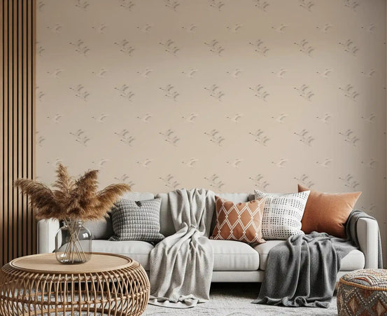 Flying birds in muted tones on soft ochre repeating pattern wallpaper GD11012