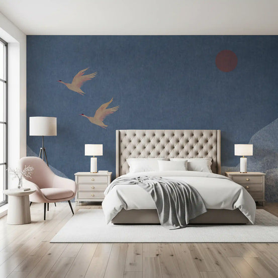 Two cranes in flight over layered mountain ridges on slate blue wall mural GD11017