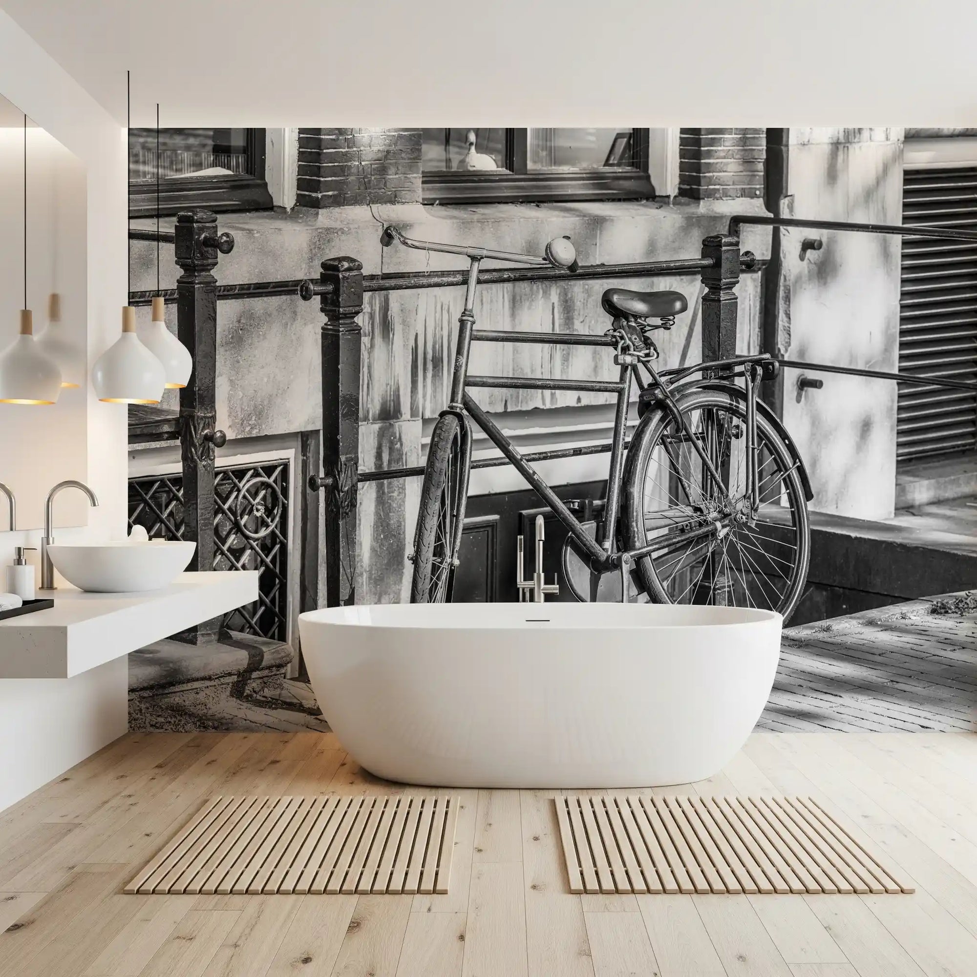 Black and white bicycle mural leaning against iron street railings GD11156