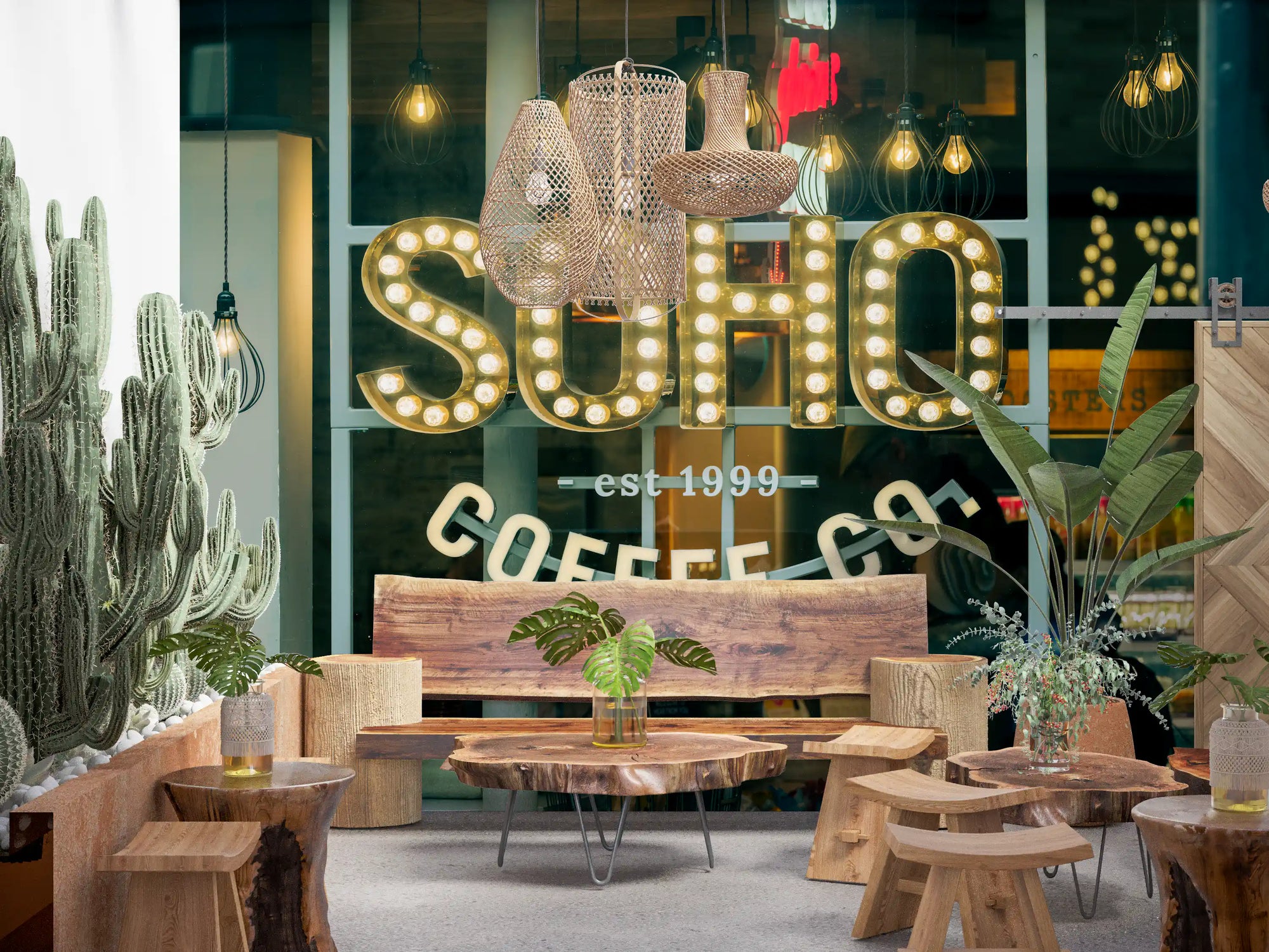Glowing coffee house sign mural with marquee bulb letters on a dark storefront GD11199