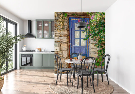 Weathered blue panelled door mural set in a rustic sandy stone wall GD11217