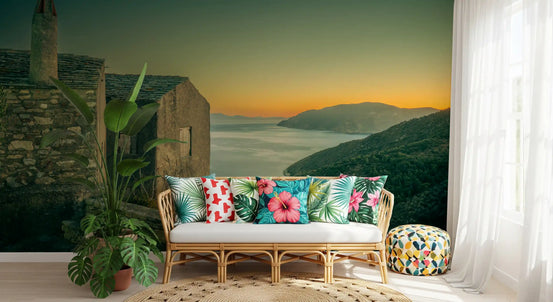 Cliffside stone houses mural overlooking a calm bay at golden hour GD11218
