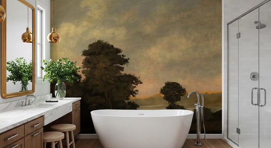 Rustic sunset landscape wall mural with silhouetted trees and amber sky in bathroom GD11239