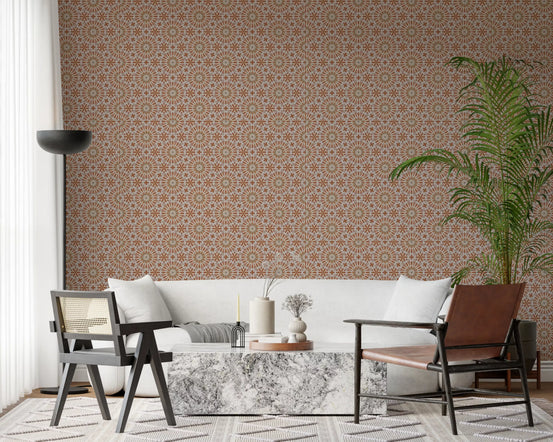 Terracotta geometric wallpaper with spoked starburst tiles in rust and ochre GD11360