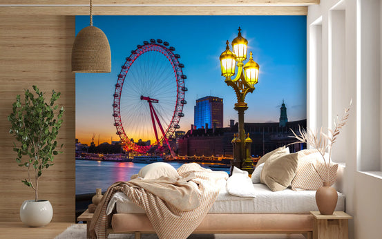 Twilight vista wall mural with a red lit observation wheel by a river GD11404