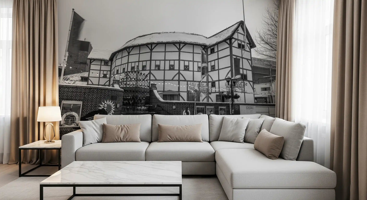 Black and white winter mural of a timber-framed building with snowy roof in living room GD11427