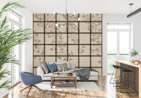 Taupe ginkgo branches draping across an ordered shoji screen mural grid GD11495