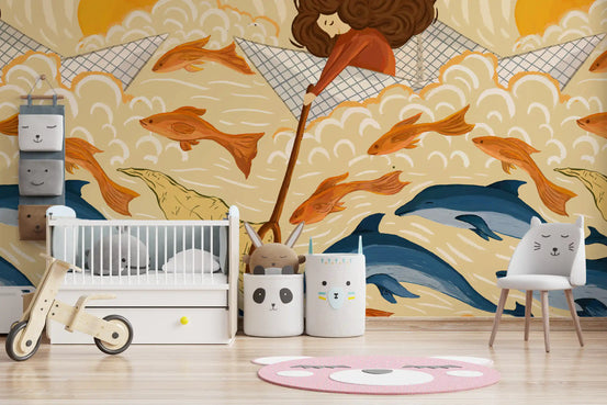 Blue dolphins leaping through cream clouds beside orange fish wall mural GD11512