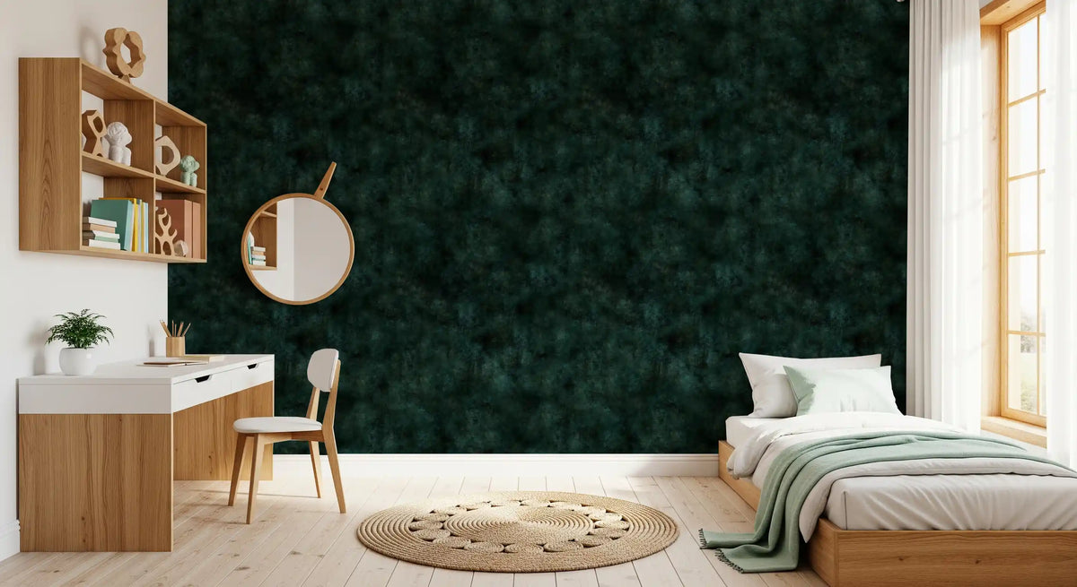 Mineral wallpaper with a mottled painterly texture in deep pine green tones GD11567